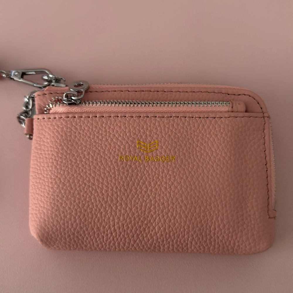 Pink leathery wallet wristlet